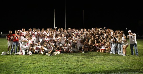 students on football field